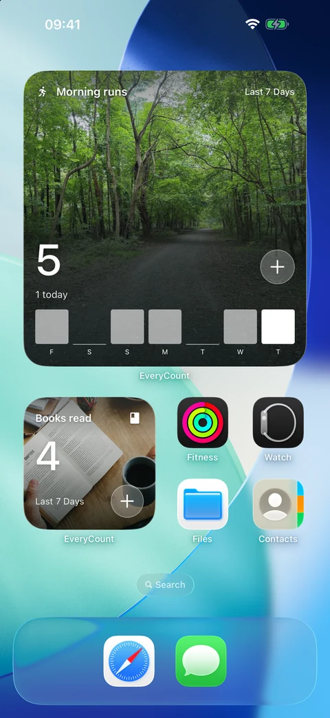 Un écran d’accueil d’iPhone avec un grand widget EveryCount affichant une photo, le décompte et la semaine